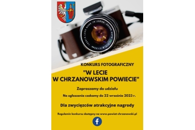 Aparat fotograficzny i herb powiatu chrzanowskiego 